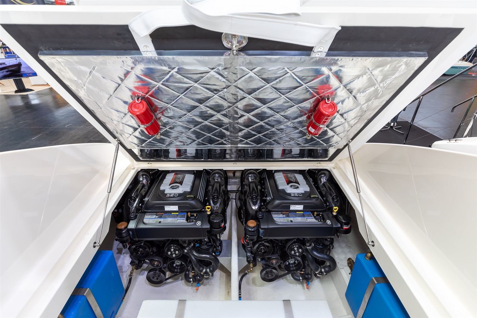 Twin MerCruiser sterndrive engines in a boat engine bay